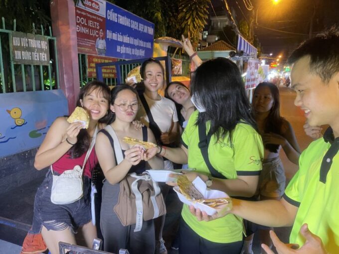 Saigon: Night Sightseeing And Street Food Tour By Vespa - Night Atmosphere of Saigon