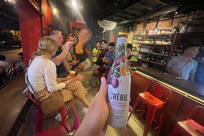 Saigon Night Street Food and Craft Beer Tour by Vespa Scooter - Flower Market Stop