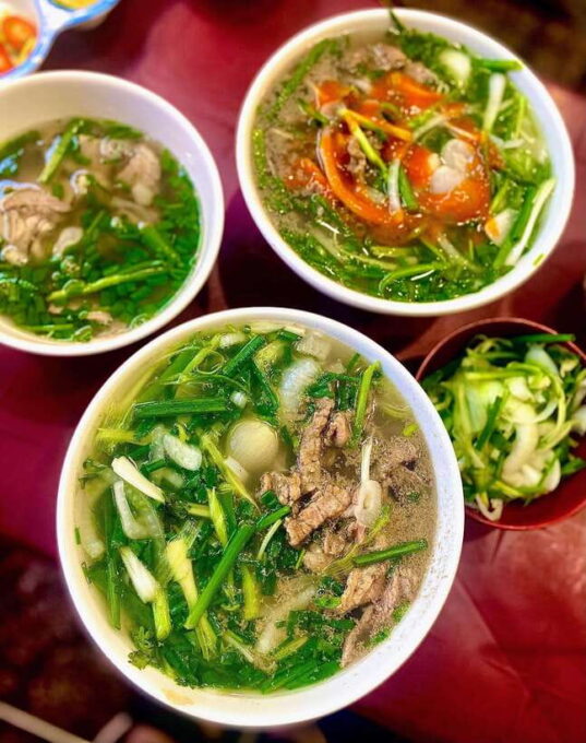 Saigon: Street Food Discovery & Local Culinary Journey - High-quality Helmet and Rain Poncho Provided