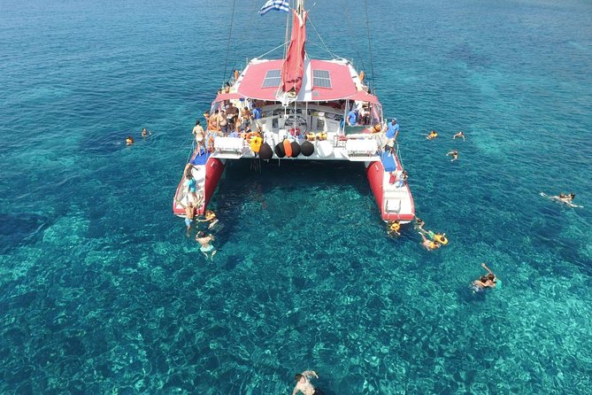 Sailing Catamaran Cruise in Santorini With Bbq, Drinks and Transfer - Exciting Swimming and Snorkeling