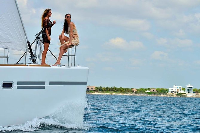 Sailing Catamaran PLATINO With Open Bar to Isla Mujeres - Flexible Pickup Options