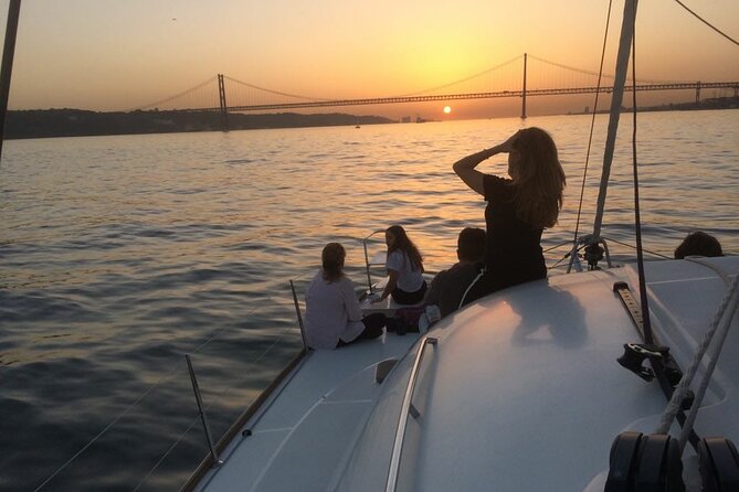 Sailing Catamaran Sunset Group Cruise With Welcome Drink - Meeting Point and Pickup