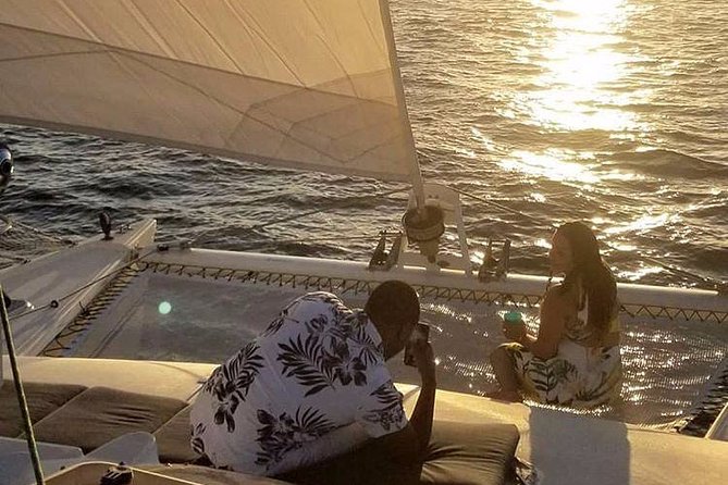 San Juan Catamaran Sunset Sail With Drinks Included - Crew and Atmosphere