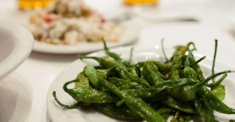 San Sebastian: Guided Food Walking Tour With Wine Tasting - Sampling Classic and Modern Pintxos
