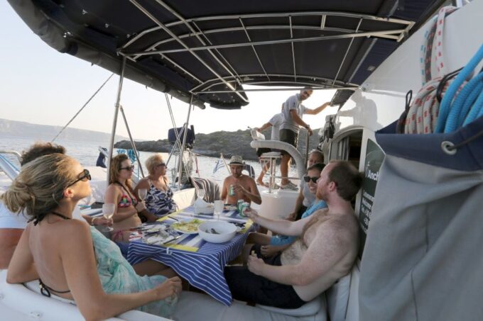 Santorini: 7-Hour Private Catamaran Cruise With Food & Drink - Booking and Cancellation
