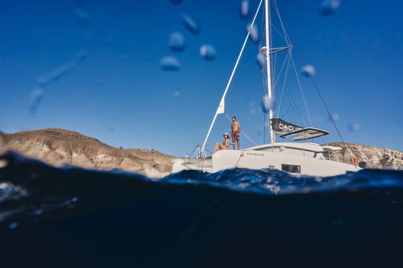 Santorini: Caldera Catamaran Cruise With Meal & Drinks - Key Points