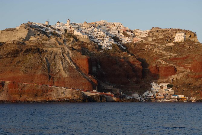 Santorini Caldera Sunset Sailing Cruise With Dinner and Wine - Sunset Viewing in Oia Village