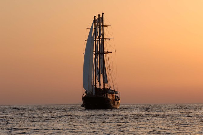 Santorini Caldera Sunset Sailing Cruise With Dinner and Wine - Included Amenities and Inclusions