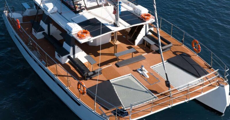 Santorini: Catamaran Caldera Cruise With Meal and Drinks - Exploring Unmanned Beaches