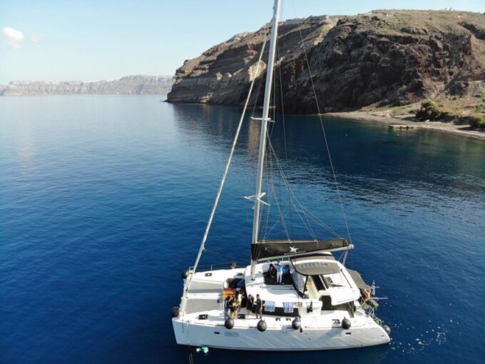 Santorini: Catamaran Cruise With Meal & Open Bar - Booking and Flexibility