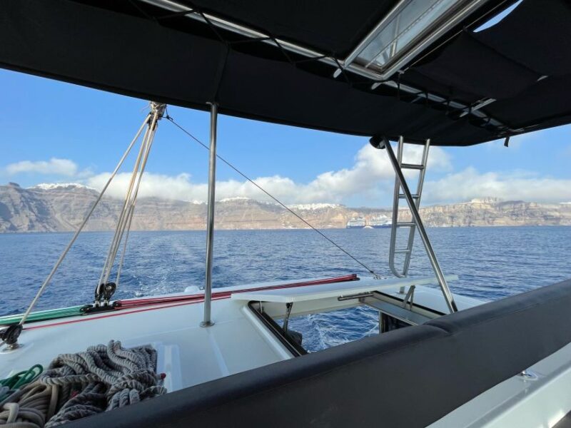 Santorini Catamaran Cruise With Swimming, Meal and Open Bar - Hotel Transfers and Logistics