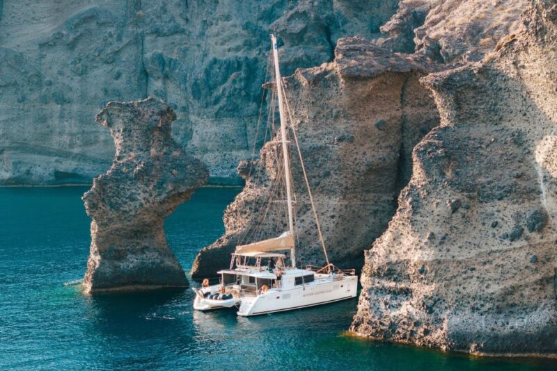 Santorini Catamaran Day Cruise: Lunch, Drinks and Transfers - Highlights