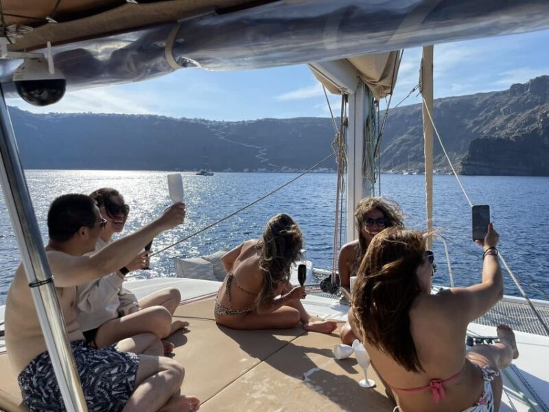 Santorini Catamaran Day Cruise: Lunch, Drinks and Transfers - Availability