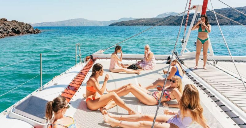 Santorini: Catamaran Tour With BBQ Dinner, Drinks, and Music - Inclusions