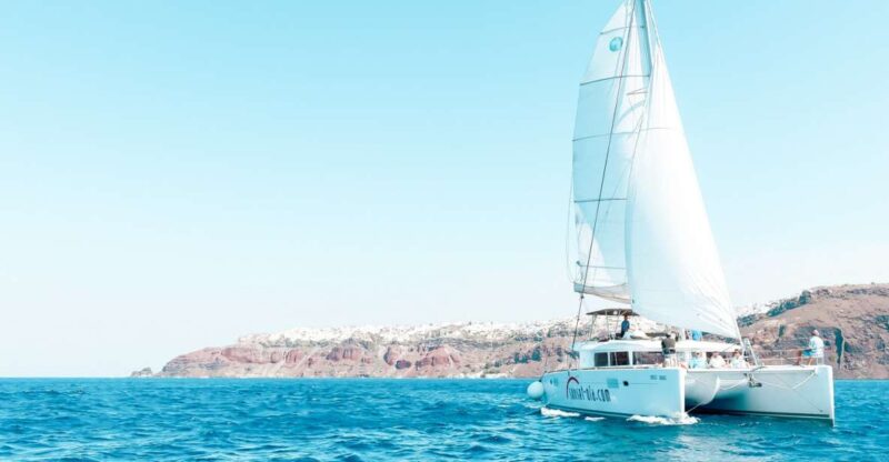 Santorini: Catamaran Tour With BBQ Meal and Unlimited Drinks - Picturesque Santorini Spots