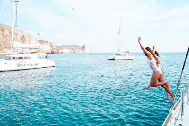 Santorini: Catamaran Tour With BBQ Meal and Unlimited Drinks - Swimming and Hot Springs