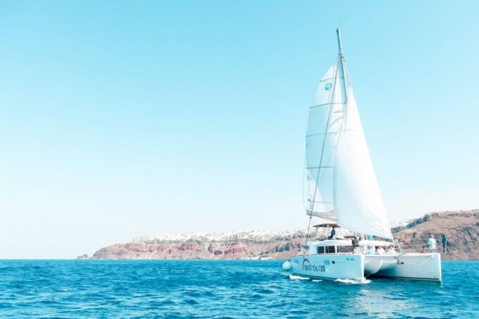 Santorini: Catamaran Tour With BBQ Meal and Unlimited Drinks - Important Information and Booking