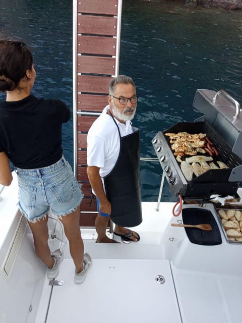 Santorini Cruise With Swim Stops & Meal - Key Points