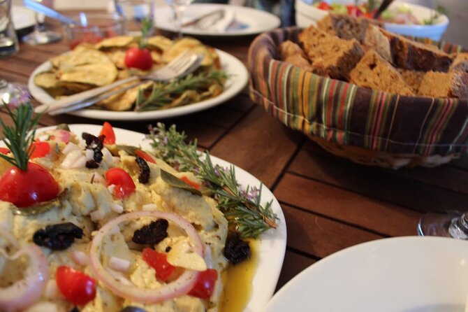 Santorini Family Farm Food & Wine Tour With Cooking Class - Volcanic Wines and Caldera Views
