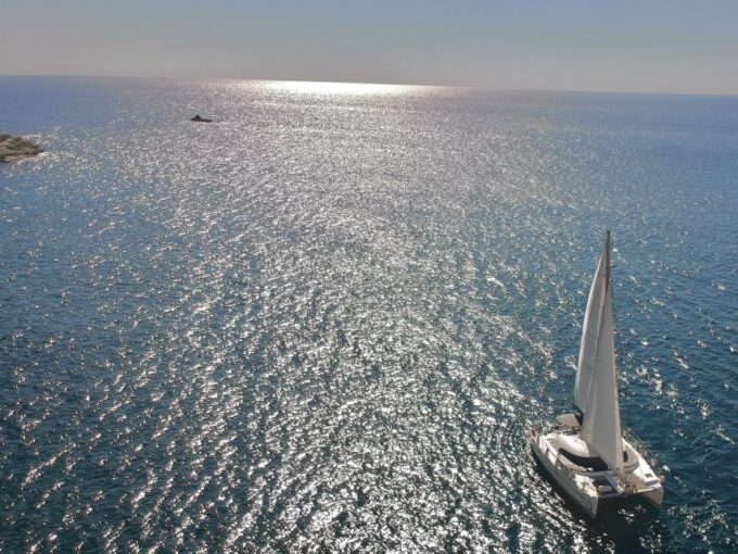 Santorini: Full Day Catamaran Excursion With Food & Drinks - Safety and Equipment Provided