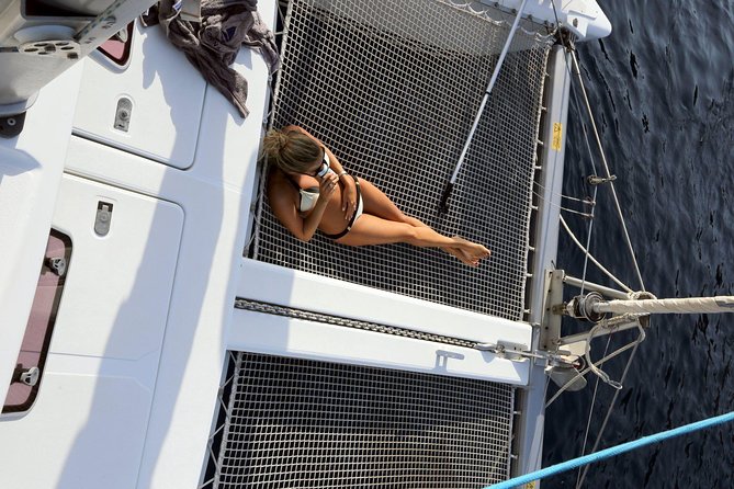 Santorini Full Day Catamaran Private Cruise Incl. Meal, Drinks & Free Transport - Swimming and Snorkeling