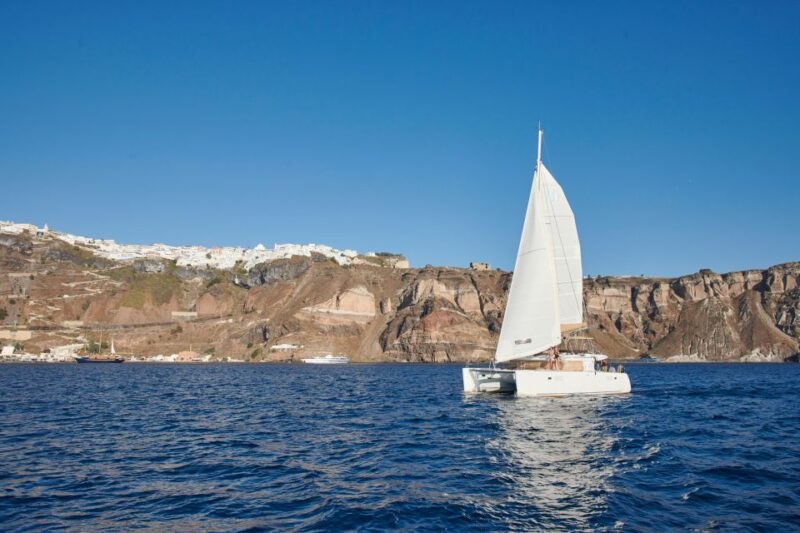 Santorini Gold Catamaran Cruise With Snorkel, BBQ & Open Bar - Soak in Volcanos Hot Springs