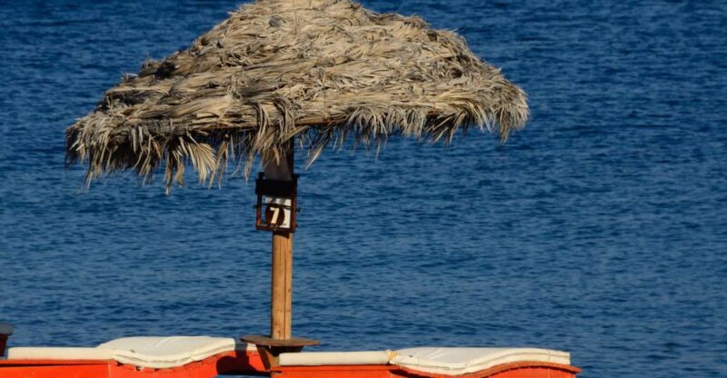 Santorini Highlights Guided Tour With Black Beach - Key Points