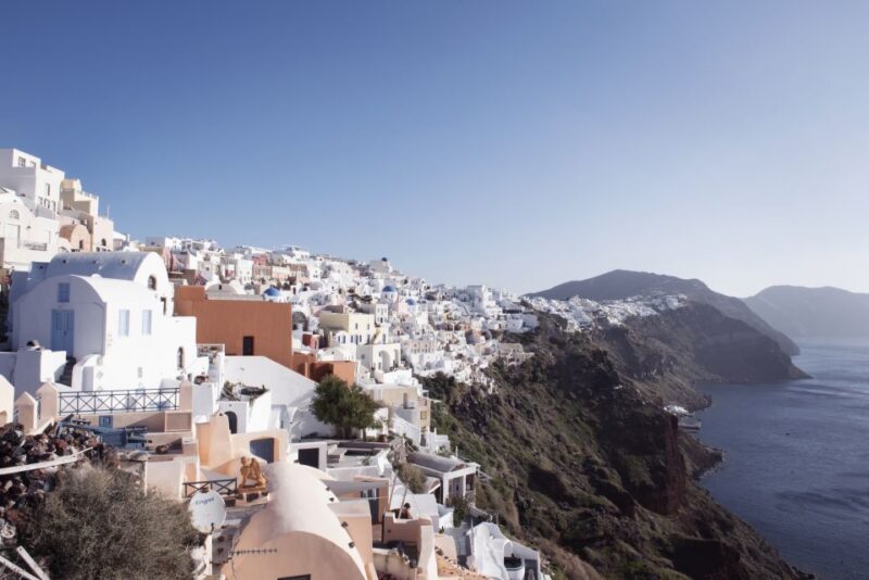 Santorini Highlights Guided Tour With Black Beach - Explore Oias Highlights