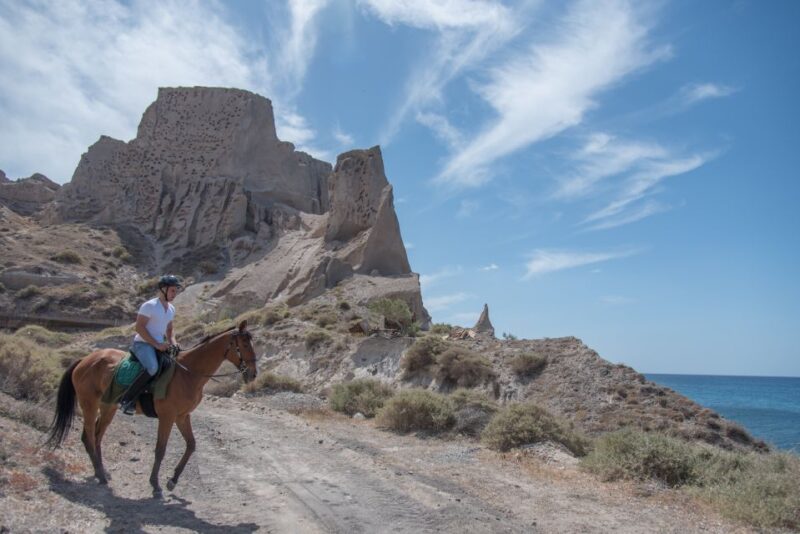 Santorini: Horse Riding Trip to Black Sandy Beach - Expert-Guided Tour