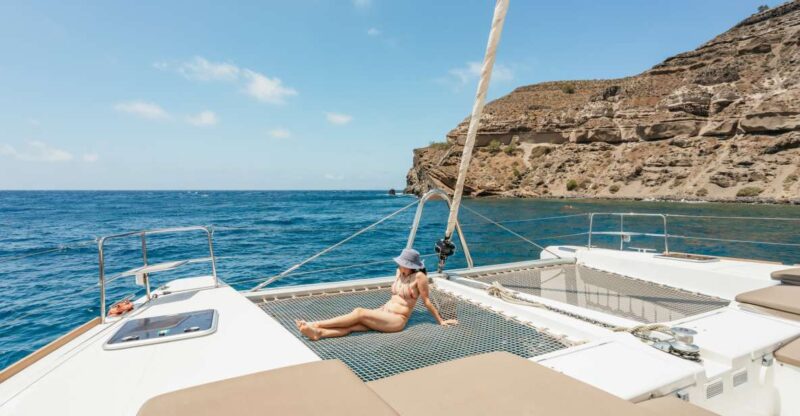 Santorini: Luxury Catamaran Day Trip With Meal and Open Bar - Included Amenities