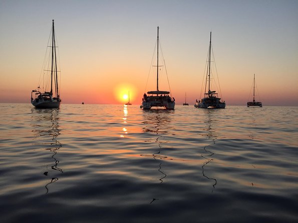 Santorini Luxury Catamaran Sunset Cruise With Bbq, Drink and Transfer - Homemade Greek Barbecue Lunch