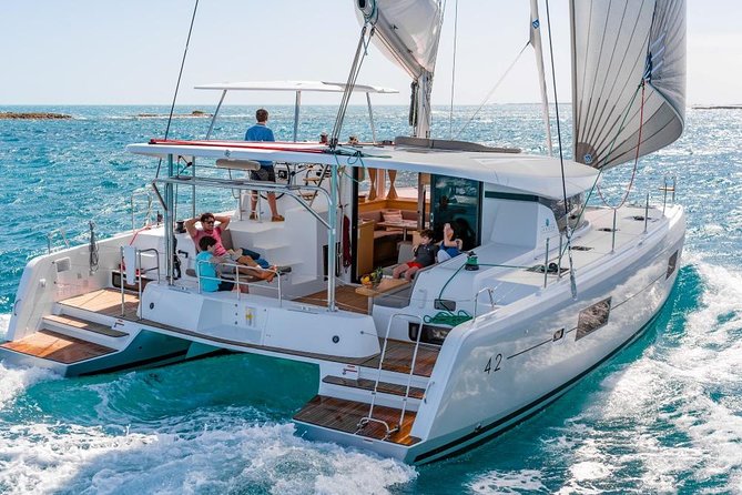 Santorini Luxury Cruise With Full Greek Meal and 2 Swim Stops - All-Inclusive Catamaran Cruise Experience