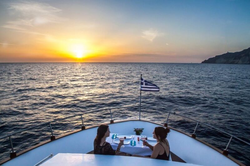Santorini: Motor Yacht Sunset Cruise With 5-Course Dinner - Restrictions and Considerations