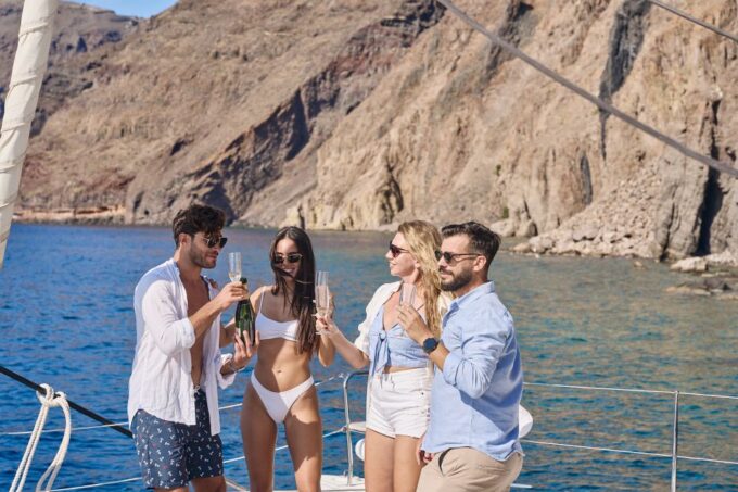 Santorini Oia: Caldera Catamaran Cruise With Meal & Drinks - Dining and Refreshments