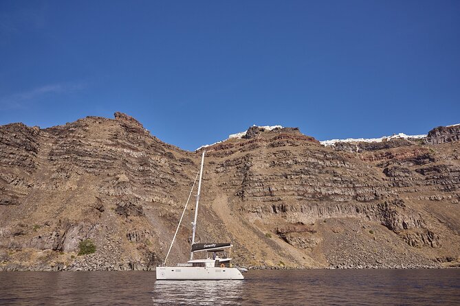 Santorini Oia: Caldera Luxury Sunset Cruise With BBQ & Drinks - Health and Safety Measures