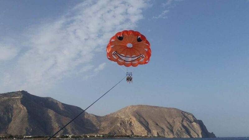 Santorini: Parasailing Flight Experience at Black Beach - Safety Briefing and Speedboat Ride