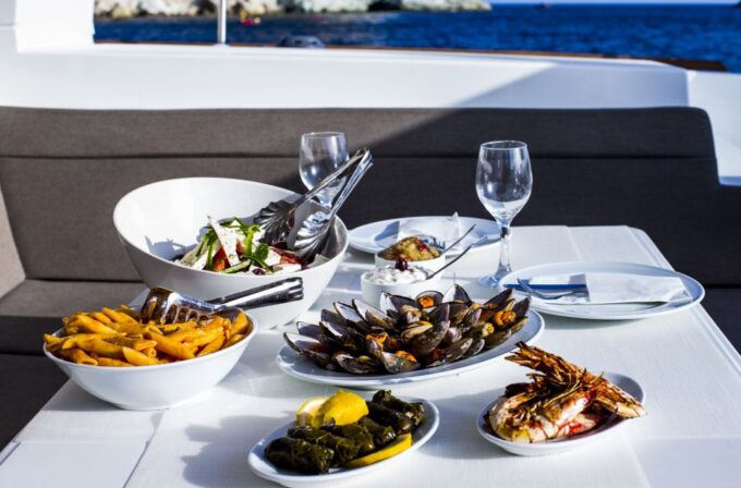 Santorini: Private Catamaran Cruise With BBQ Meal and Drinks - Discover Hidden Caves