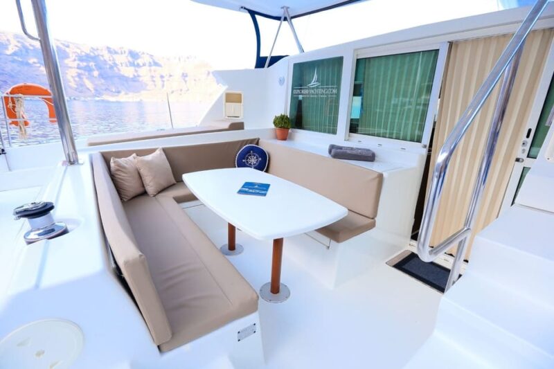 Santorini: Private Catamaran Sunset Cruise With Dinner - Onboard Experience