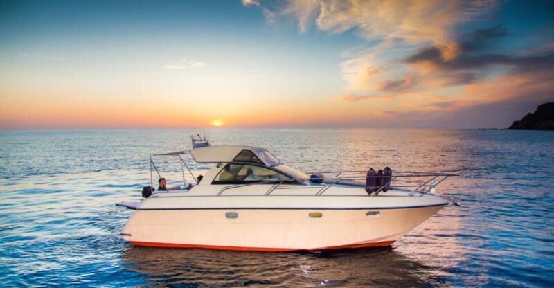 Santorini: Private Day Cruise With Barbeque and Drinks - Strolling Through the Town of Oia