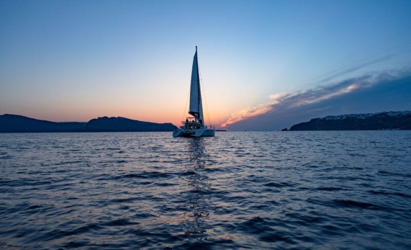 Santorini: Private Sunset Cruise With Dinner and Drinks - Key Experiences
