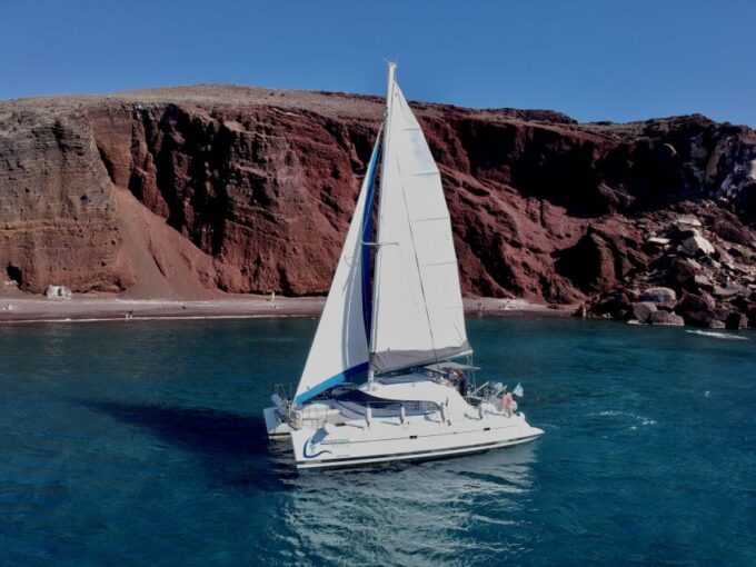 Santorini: Semi-Private Catamaran Cruise With Food & Drinks - Safety Briefing and Van Transfer