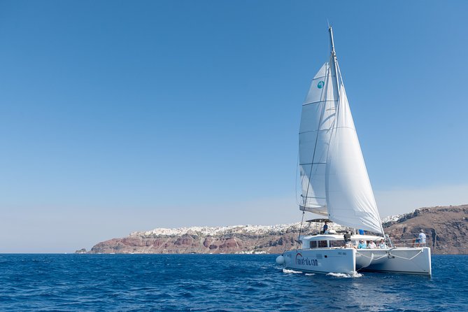 Santorini Small-Group Catamaran Sailing Trip(Bbq,Drinks, Transfer) - Enjoying the Volcanic Hot Springs