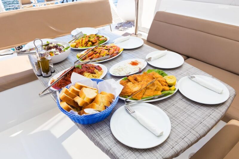 Santorini: Sunset Boat Cruise With BBQ Meal & Wine - Attire and Gear