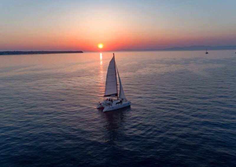 Santorini: Sunset Cruise With Swim Stops, Dinner, and Drinks - Tour Summary