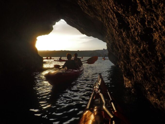 Santorini: Sunset Sea Kayak With Light Dinner - Discovering Black, White, and Red Beaches