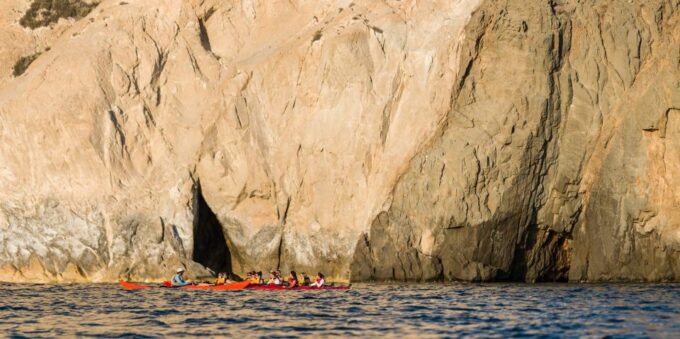 Santorini: Sunset Sea Kayak With Light Dinner - Exploring a Sea Cave and Swimming
