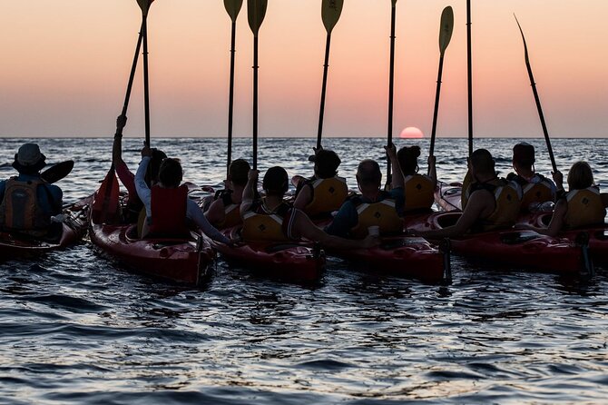 Santorini: Sunset Sea Kayak With Light Dinner - Snorkeling in the Aegean Sea