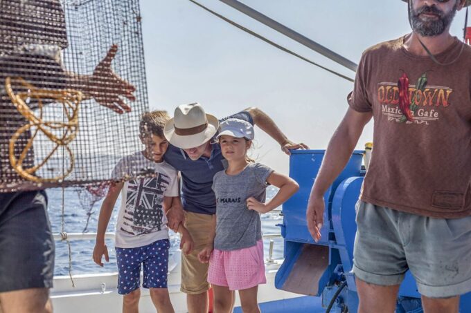 Santorini: Traditional Fishing Trip and Fresh Fish Lunch - Language Support for Participants