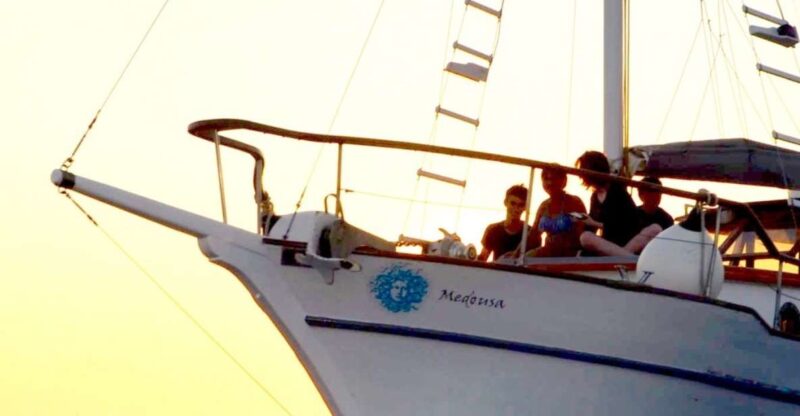 Santorini: Traditional Wooden Boat Tour With Meal and Wine - Greek Lunch/Dinner and Local Wine