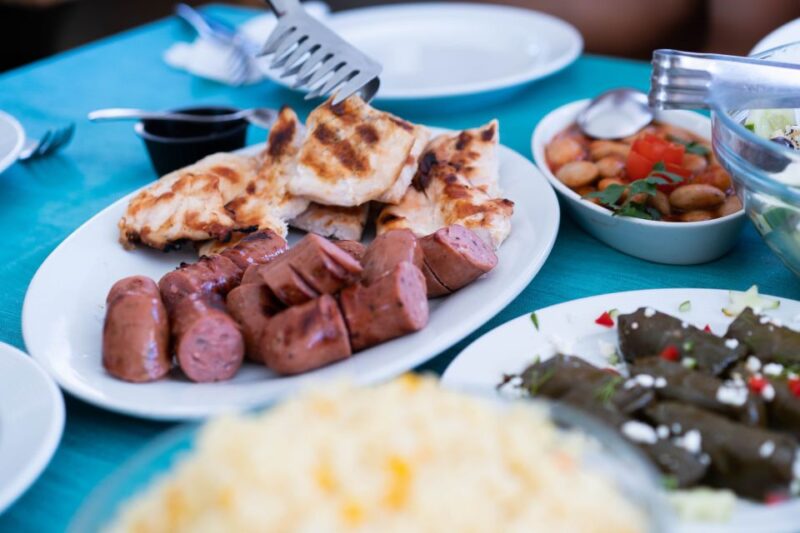 Santorini: Traditional Wooden Boat Tour With Meal and Wine - Hotel Pickup and Drop-off